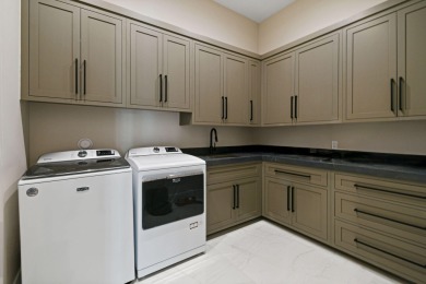 Experience the ultimate in coastal living with this custom-built