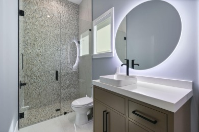 Experience the ultimate in coastal living with this custom-built