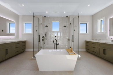 Experience the ultimate in coastal living with this custom-built