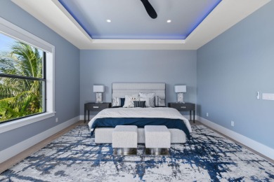 Experience the ultimate in coastal living with this custom-built