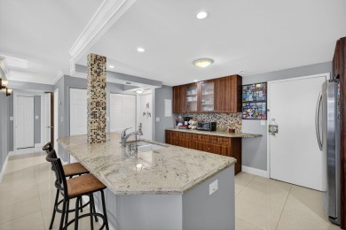 Experience oceanfront living on prestigious Hillsboro Mile! This