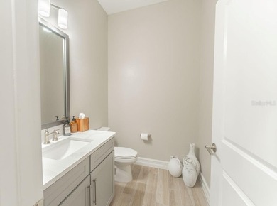 This exquisite four-bedroom, three-and one-half bath luxury