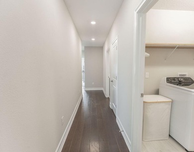 This exquisite four-bedroom, three-and one-half bath luxury