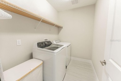 This exquisite four-bedroom, three-and one-half bath luxury