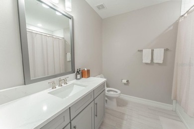 This exquisite four-bedroom, three-and one-half bath luxury