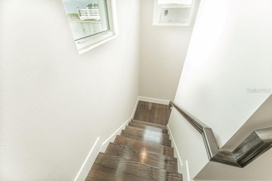 This exquisite four-bedroom, three-and one-half bath luxury