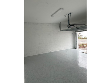 This exquisite four-bedroom, three-and one-half bath luxury