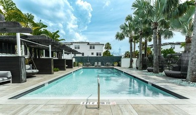 This exquisite four-bedroom, three-and one-half bath luxury
