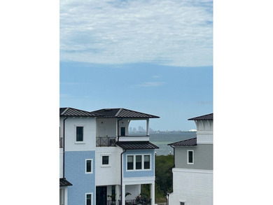 This exquisite four-bedroom, three-and one-half bath luxury