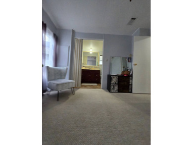 Welcome to this beautifully maintained 1990 double-wide