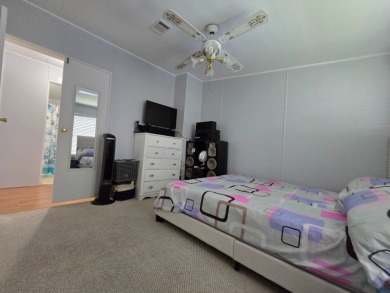 Welcome to this beautifully maintained 1990 double-wide