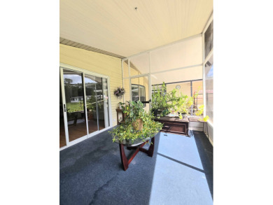 Welcome to this beautifully maintained 1990 double-wide