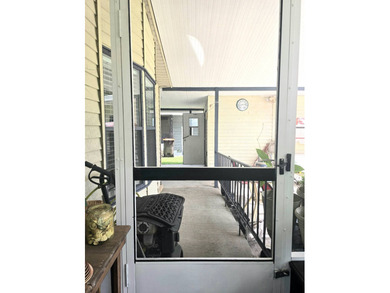 Welcome to this beautifully maintained 1990 double-wide