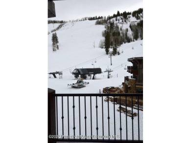 1/12 interest in a luxury condominium right at the base of