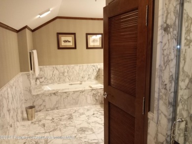 1/12 interest in a luxury condominium right at the base of