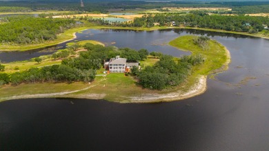 INCREDIBLE Lakefront Estate on 32 Acres with 360 degrees Water
