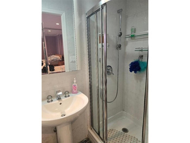 WELCOME TO THIS BEAUTIFUL, UPDATED 2 BED, 2 BATHS COOP UNIT WITH