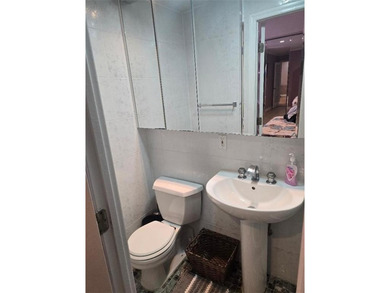 WELCOME TO THIS BEAUTIFUL, UPDATED 2 BED, 2 BATHS COOP UNIT WITH