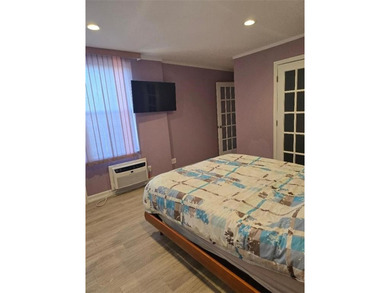 WELCOME TO THIS BEAUTIFUL, UPDATED 2 BED, 2 BATHS COOP UNIT WITH