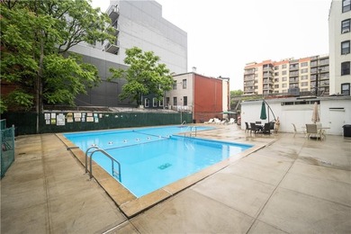 WELCOME TO THIS BEAUTIFUL, UPDATED 2 BED, 2 BATHS COOP UNIT WITH