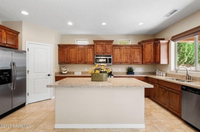 This well-maintained home is in a desirable neighborhood next to