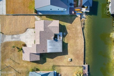 Gulf access with no HOA!! Welcome to this one owner 3-bedroom