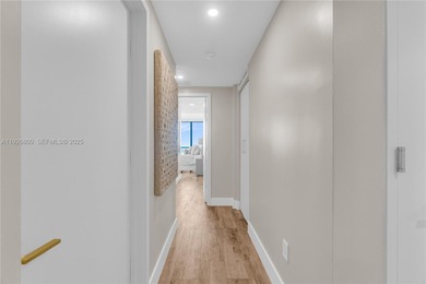 This remarkably renovated residence offers sophisticated living