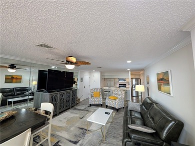 Discover waterfront living at Marina del Sol with Unit 1002C at