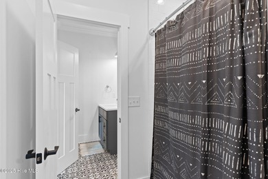 Welcome to Long Call, a luxury beachside retreat on Oak Island