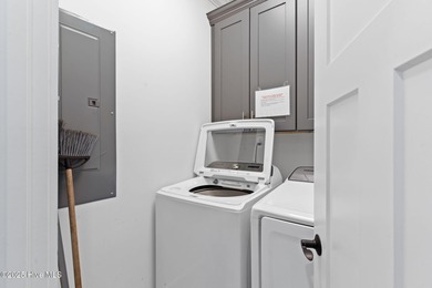 Welcome to Long Call, a luxury beachside retreat on Oak Island