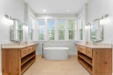 This stunning 3-bedroom, 3.5-bathroom home, designed by renowned