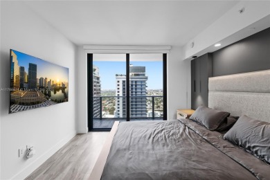 Fully remodeled 2 Bed + DEN / 2 Bath residence at SLS Lux