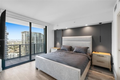 Fully remodeled 2 Bed + DEN / 2 Bath residence at SLS Lux