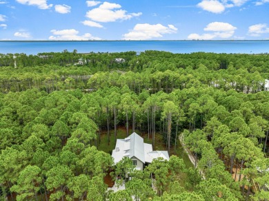 This stunning 3-bedroom, 3.5-bathroom home, designed by renowned