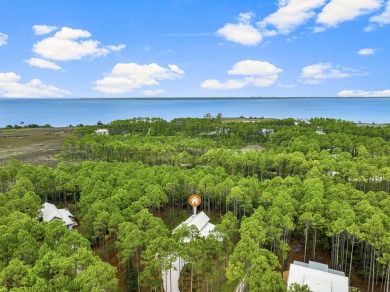 This stunning 3-bedroom, 3.5-bathroom home, designed by renowned