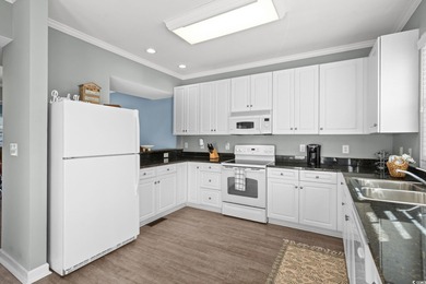 Welcome to coastal luxury living in the highly sought-after