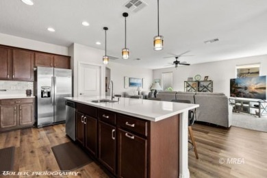 Welcome to 1221 Tortoise Ridge, a stunning single-story home at