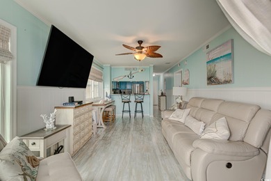 What a find! Grab a rocking chair to relax on your oceanfront