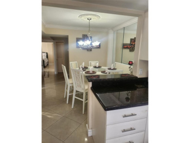 THIS IS A LOVELY 2/2 IN THE MANORS OWNER WILL SELL WITH OR