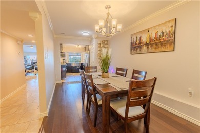 Welcome to this beautifully renovated Courtyard Townhome