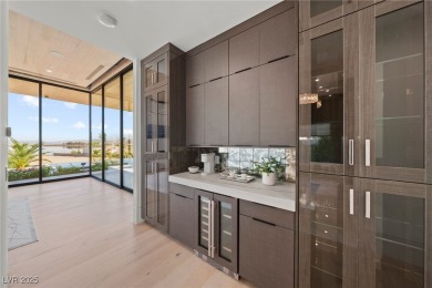 Exquisite lake view custom estate, tucked behind triple gates in