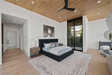 Exquisite lake view custom estate, tucked behind triple gates in