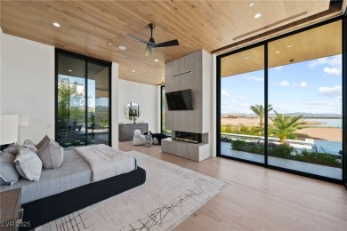 Exquisite lake view custom estate, tucked behind triple gates in