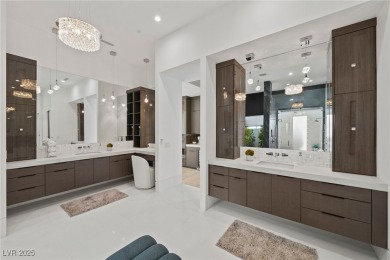 Exquisite lake view custom estate, tucked behind triple gates in