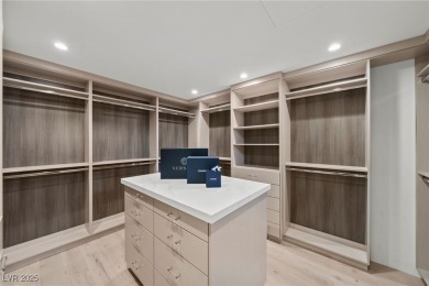 Exquisite lake view custom estate, tucked behind triple gates in