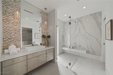 Exquisite lake view custom estate, tucked behind triple gates in