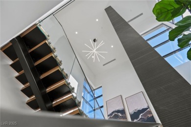 Exquisite lake view custom estate, tucked behind triple gates in