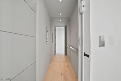 Exquisite lake view custom estate, tucked behind triple gates in