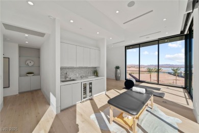 Exquisite lake view custom estate, tucked behind triple gates in