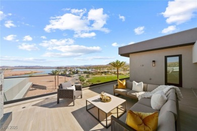 Exquisite lake view custom estate, tucked behind triple gates in